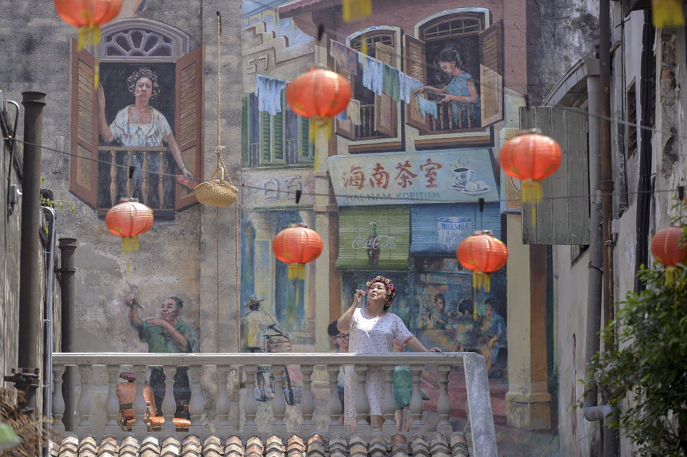 Murales vibrantes en el barrio de Kwai Chai Hong, un rincón artístico de Kuala Lumpur.